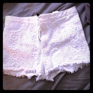Flower white jean shorts.